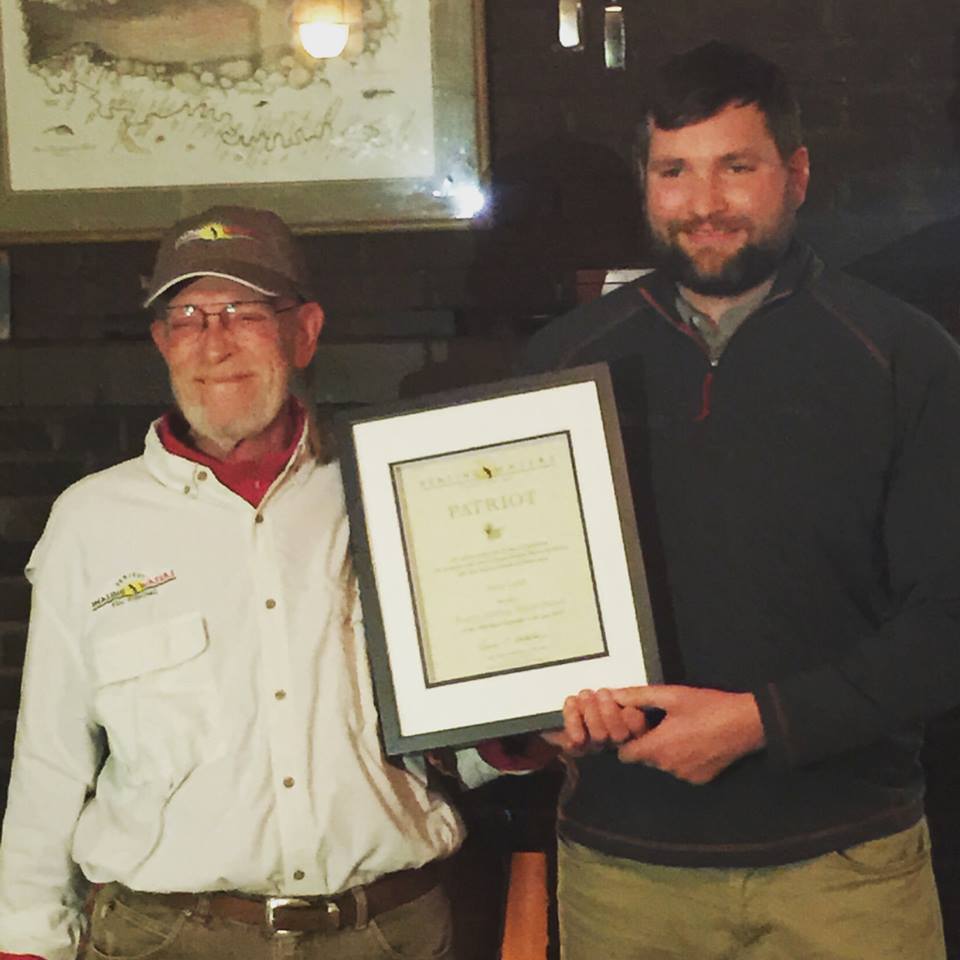 COO David Folkerts presenting Steve Ladd with our highest honor, The Patriot Award